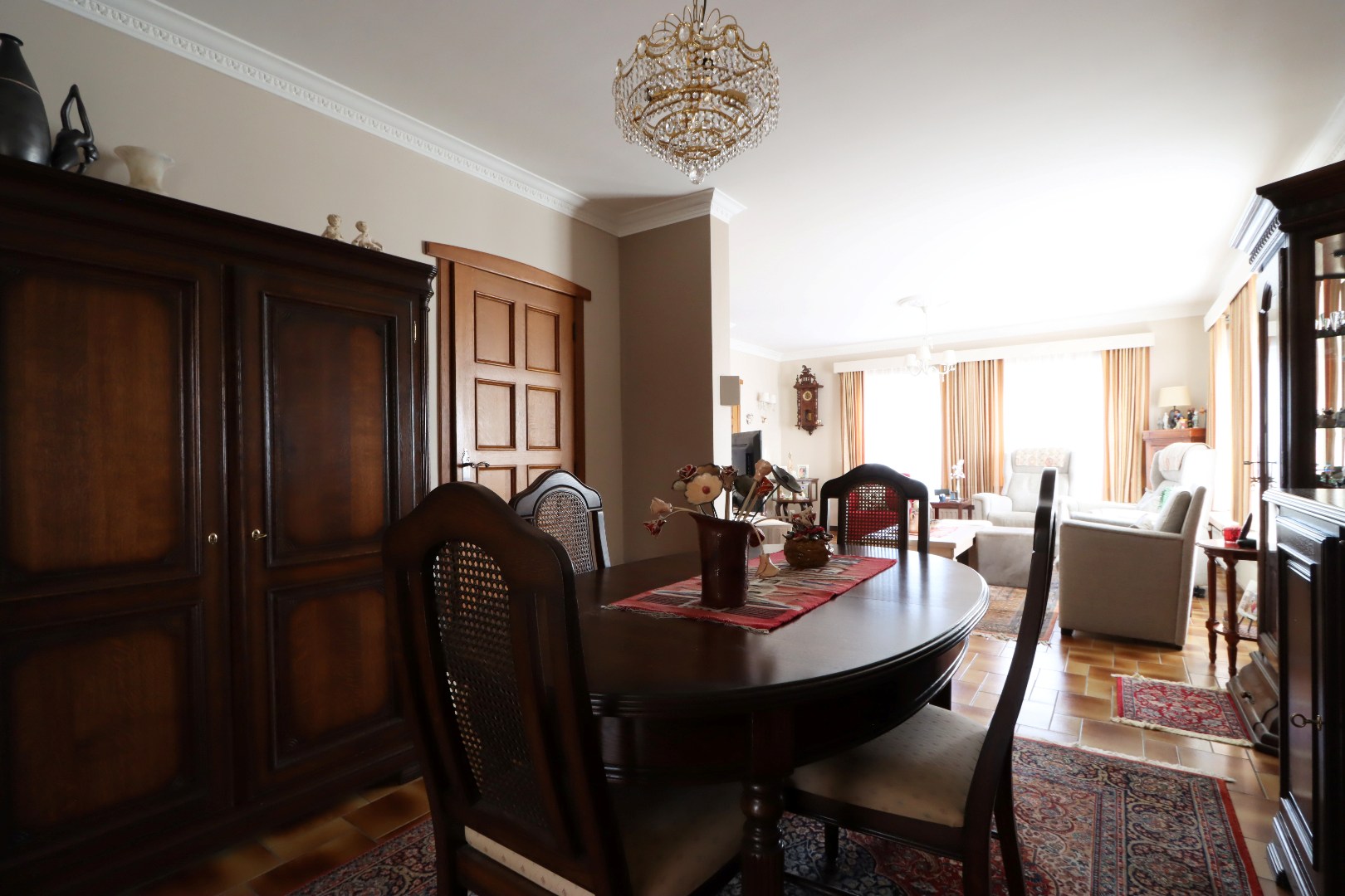 Toegang naar de veranda via een schuifraam