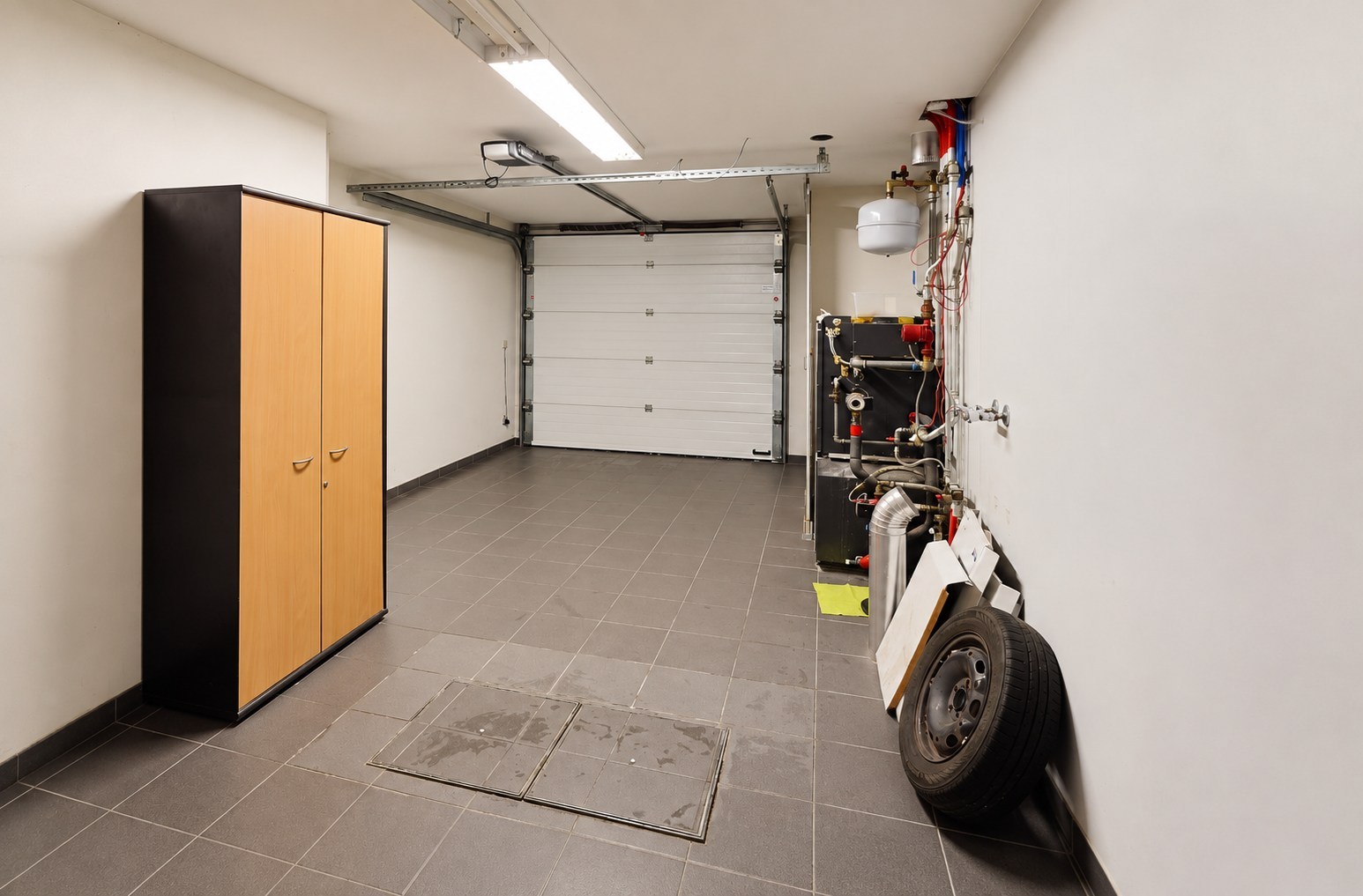 Bel-etagewoning met tuin, loods (450 m²) en tal van mogelijkheden 