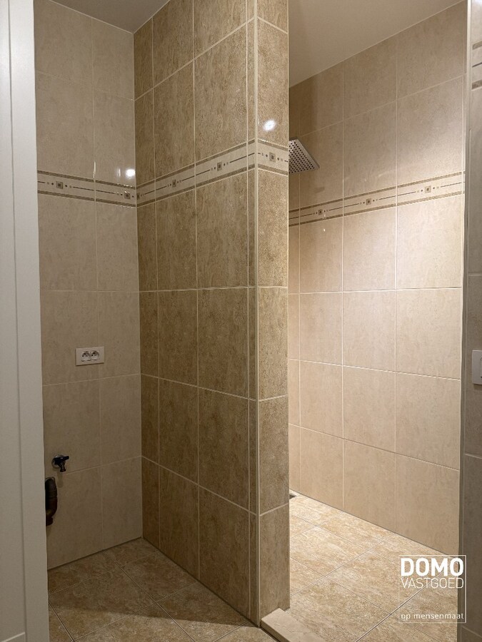 Ruim gemeubeld 2-slaapkamer appartement met terras op benedenverdieping in Halen 