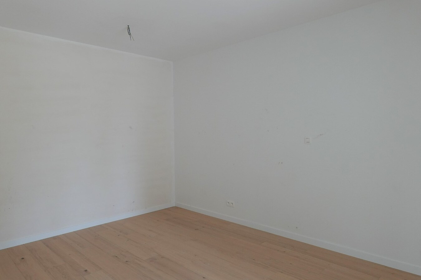 Nieuwbouwappartement met terras en tuin 