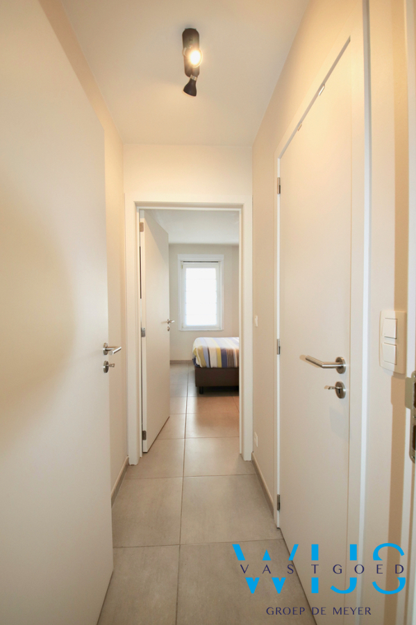 Gelijkvloers appartement met zonnige tuin &amp; dubbele garage te Sint-Laureins ! 