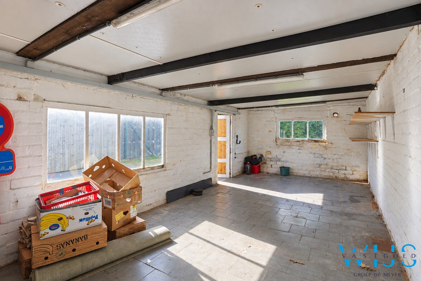 Gerenoveerde woning met diepe tuin en garage in Zelzate 