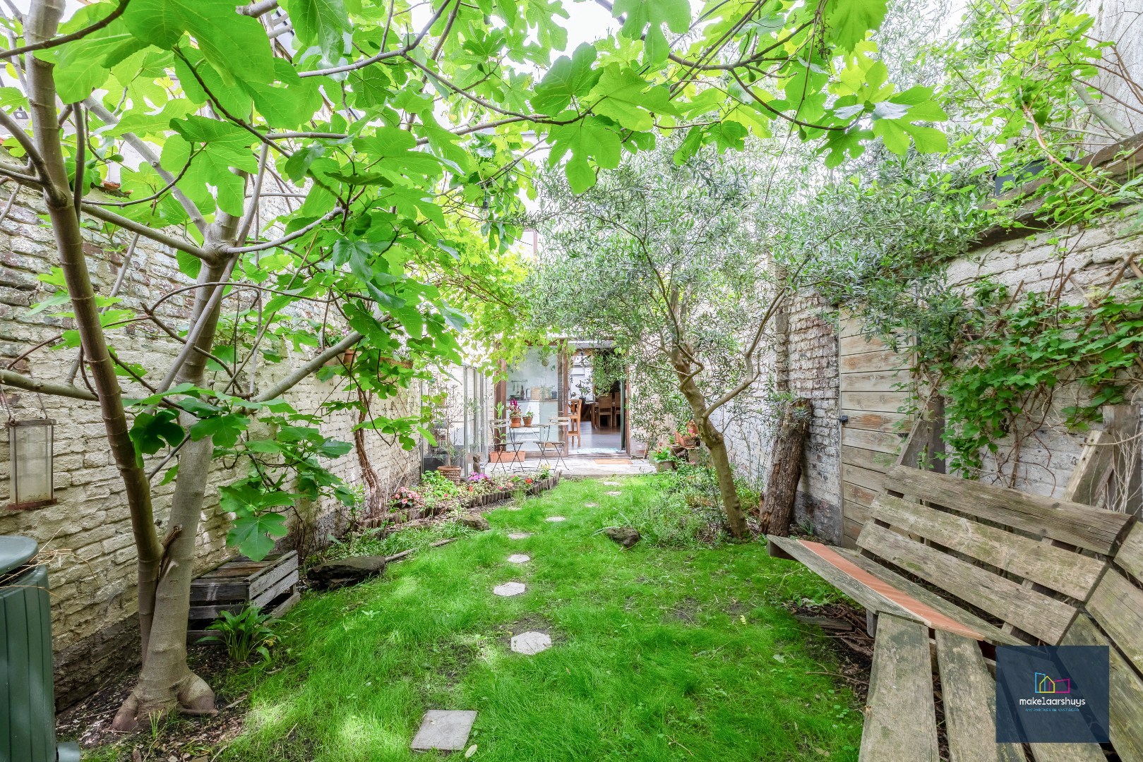 Instapklare woning met zuidgerichte tuin nabij centrum Gent 