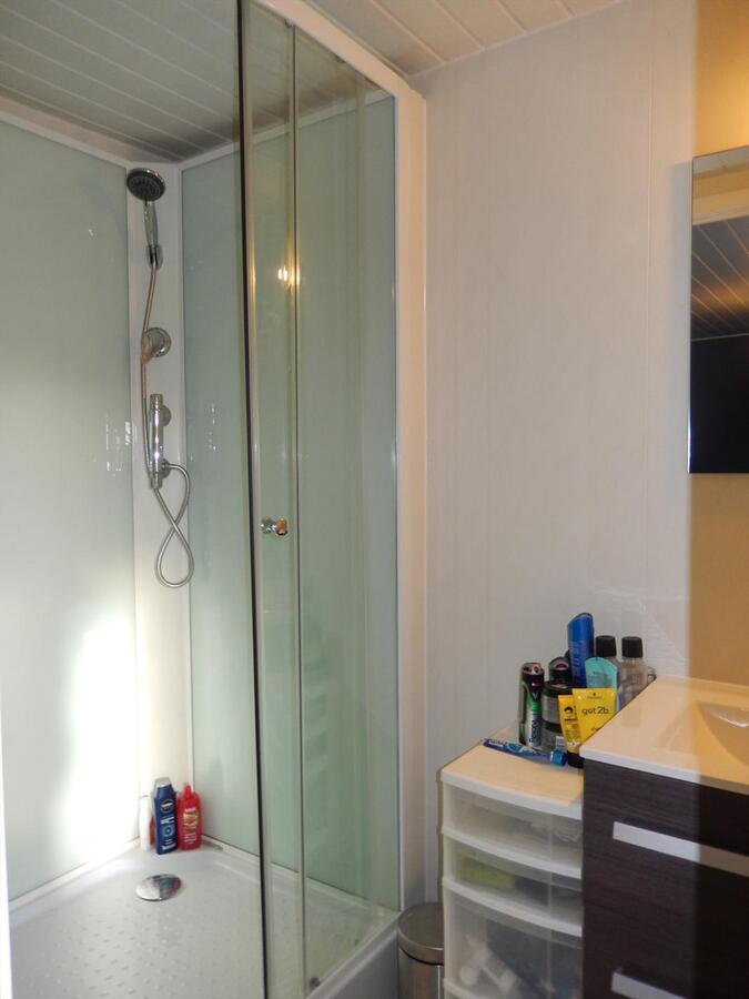 Gezellige instapklare rijwoning met koer 