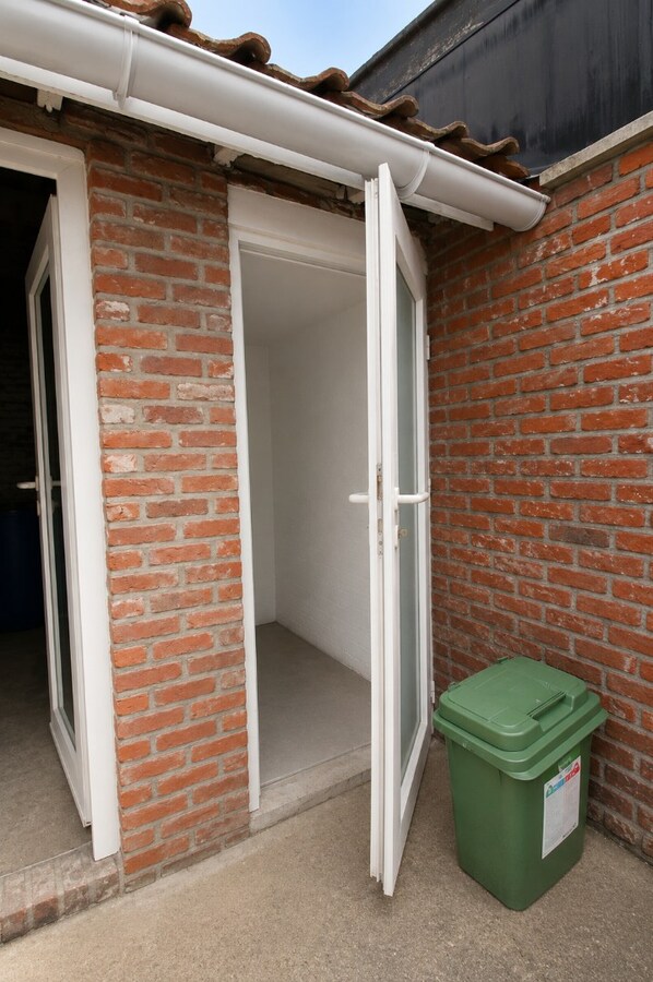 Te koop: Gezellige stadswoning met 5 slaapkamers en diepe tuin op centrale ligging Sint-Niklaas! 
