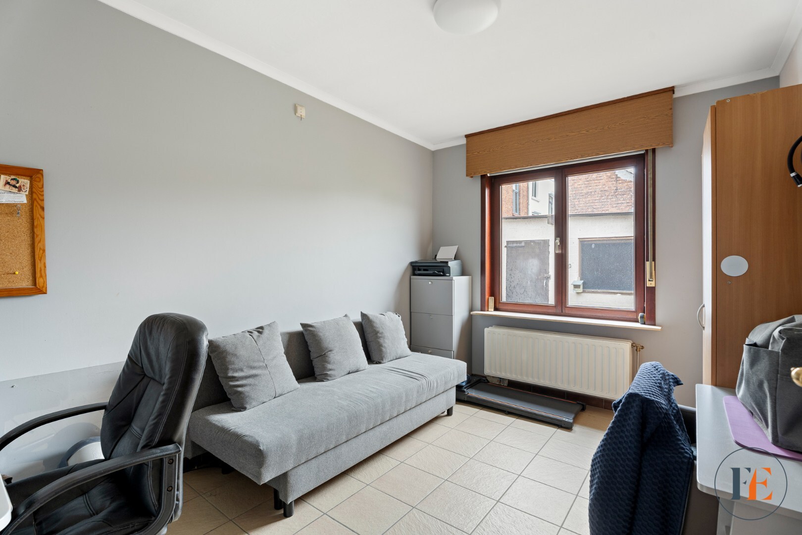 Huis met inpandige garage, tuin en  atelier te Wondelgem 