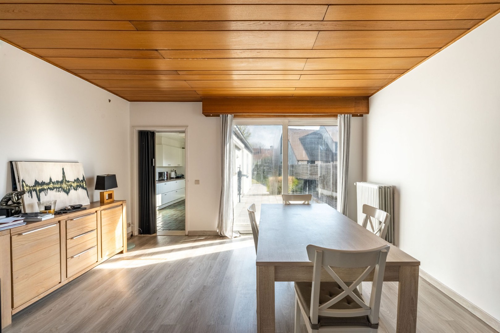 Authentieke woning met zonnige tuin, garage en bouwgrond 