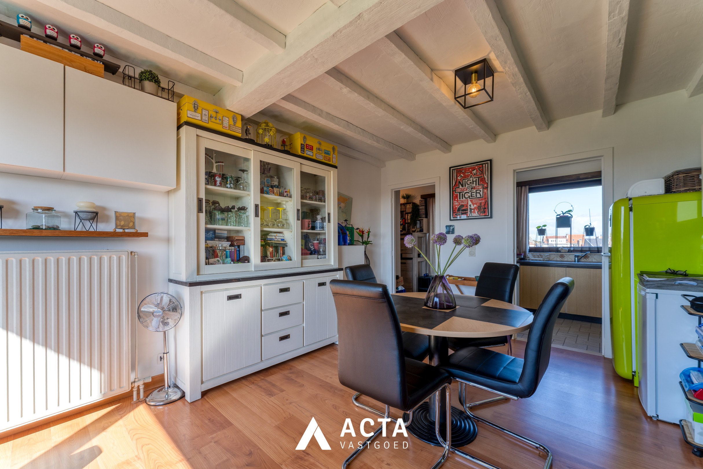 Dakappartement met zonnige terrassen in Mariakerke 