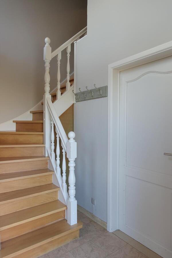 Gezellige half-open woning met zonnige tuin 