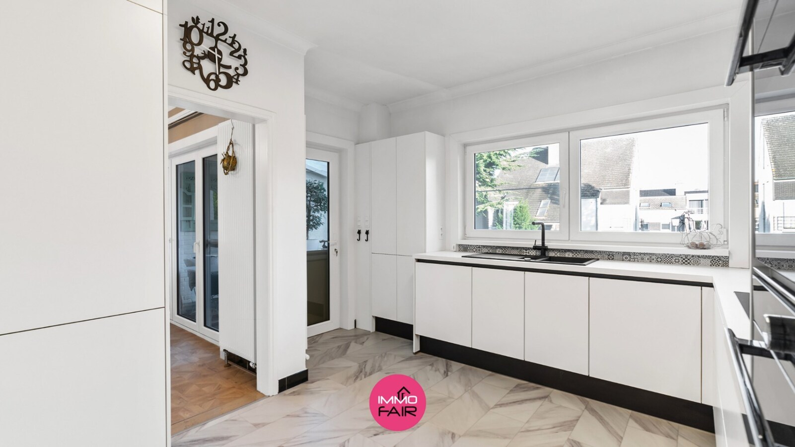 Instapklare gezinswoning met 4 slaapkamers in het hartje van Genk 