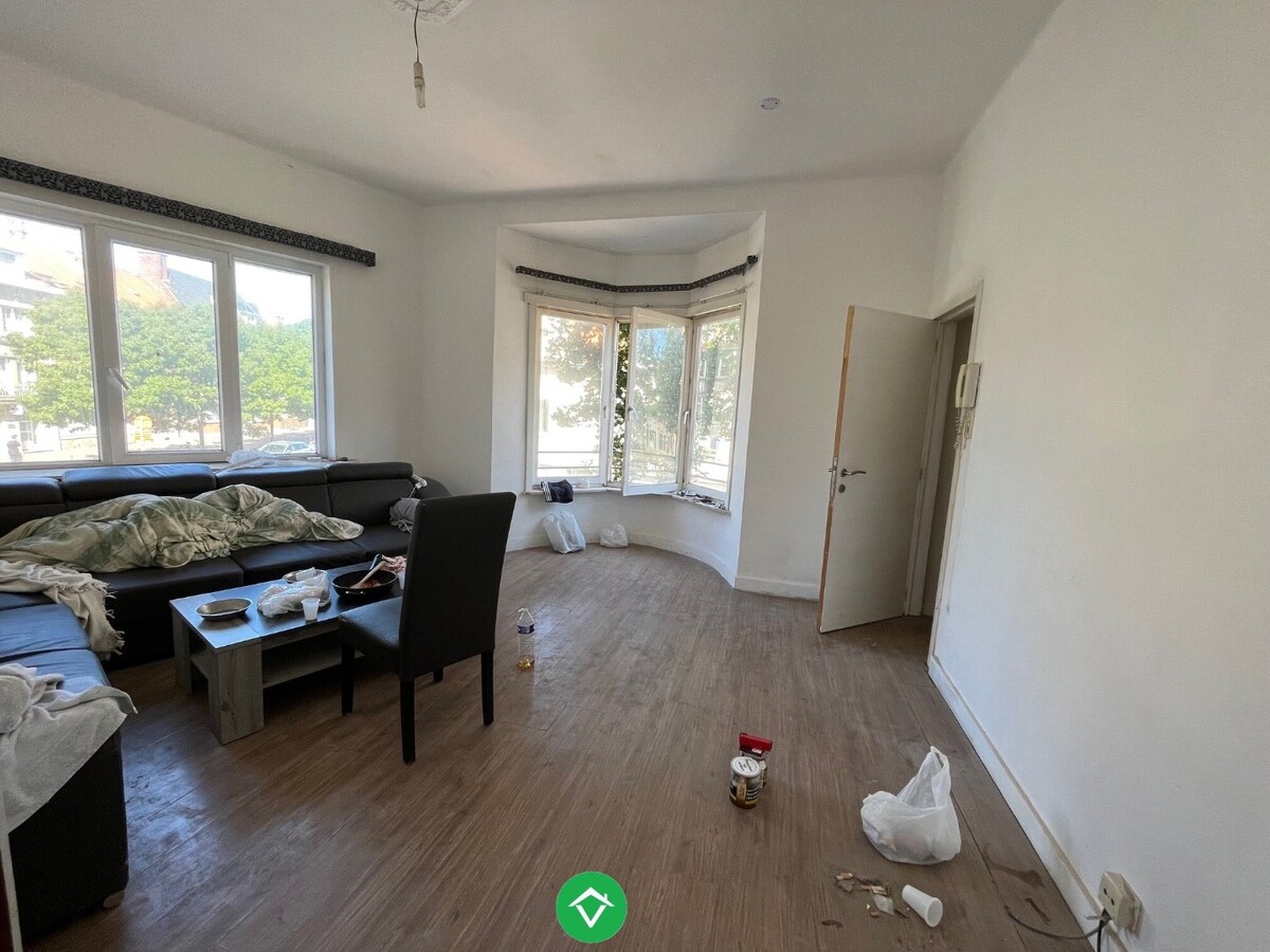 Opbrengstpand bestaande uit 3 verhuurde appartementen, gelegen aan H.Hart-Kerk 