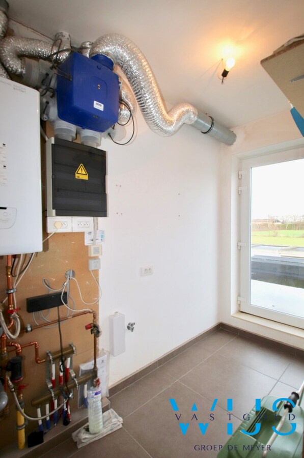 Energiezuinig 2 slaapkamerappartement met garage te Rieme! 