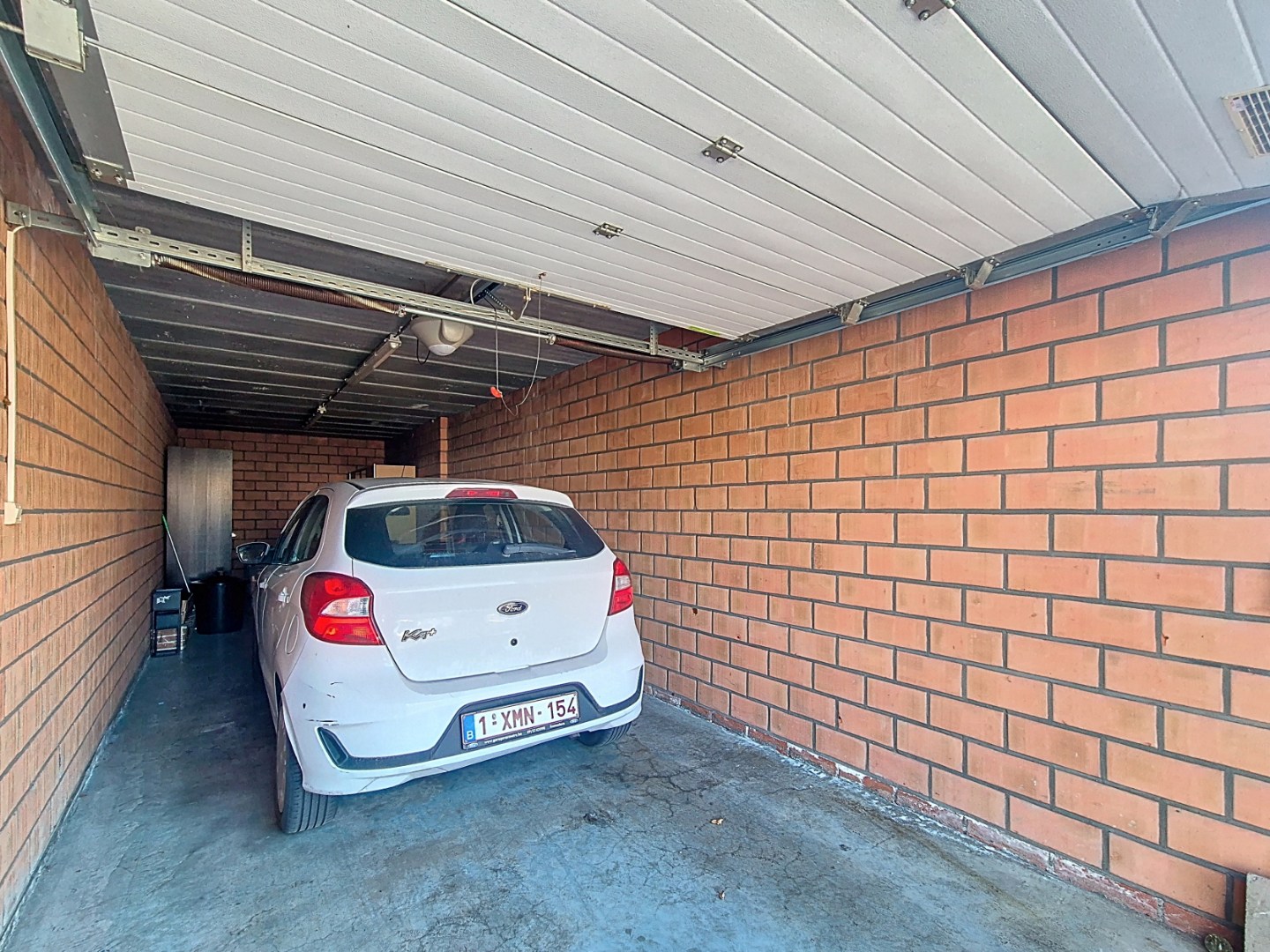 Gelijkvloers appartement met 1 slpk en garage 