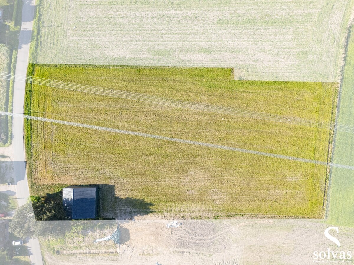 Landbouwgrond met gebouw op gunstige locatie in Maldegem 