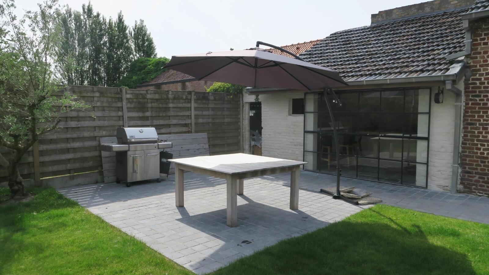 Karaktervolle halfopen woning in Centrum Woumen 