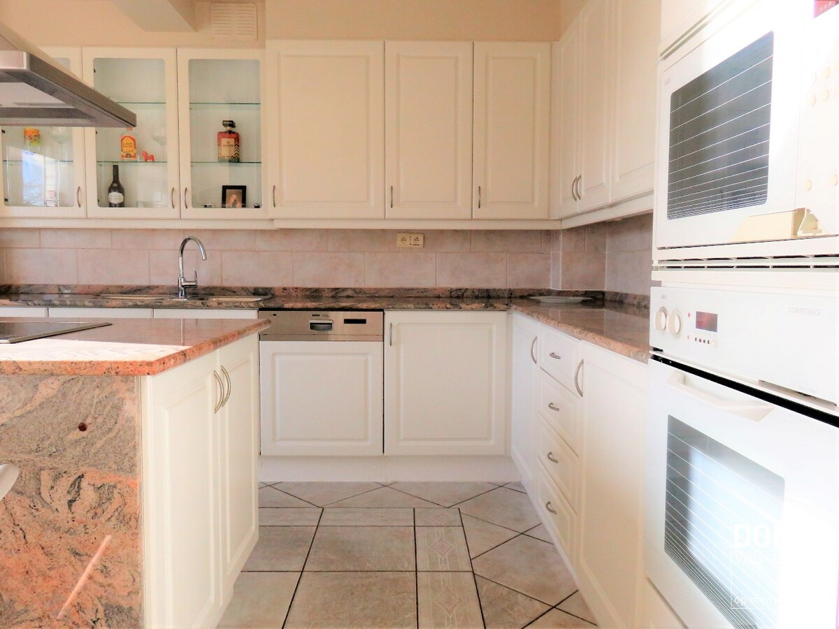 GUNSTIG GELEGEN OPBRENGSTEIGENDOM TE HASSELT 