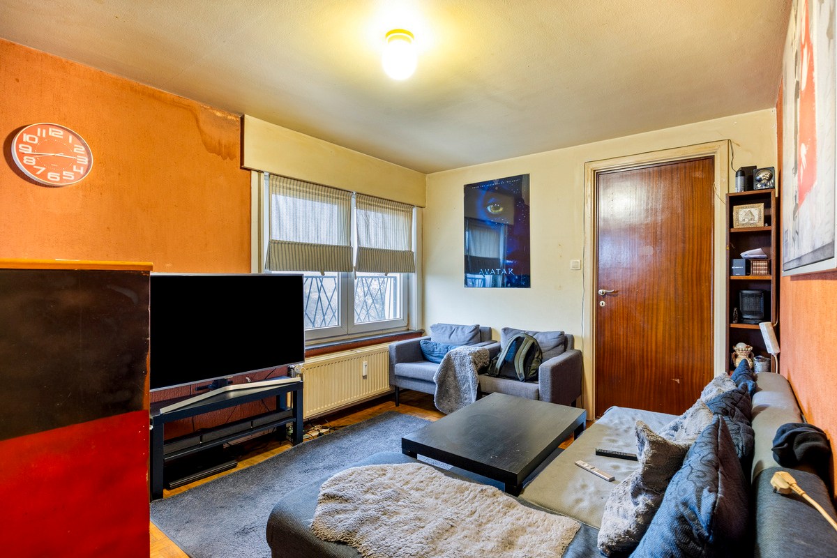 Opbrengsteigendom met handelspand en 3 appartementen te koop in Heverlee op een super ligging! 