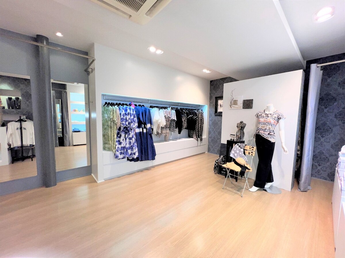 Handelspand met woonst en tuin op zeer commerciële ligging! 