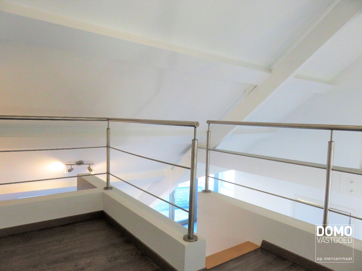 GUNSTIG GELEGEN OPBRENGSTEIGENDOM TE HASSELT 