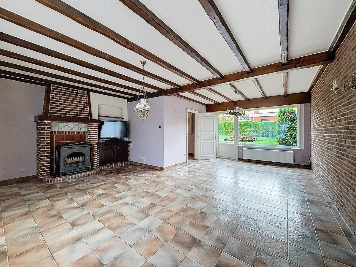 Op te frissen HOB met garage en tuin te Bijloke 