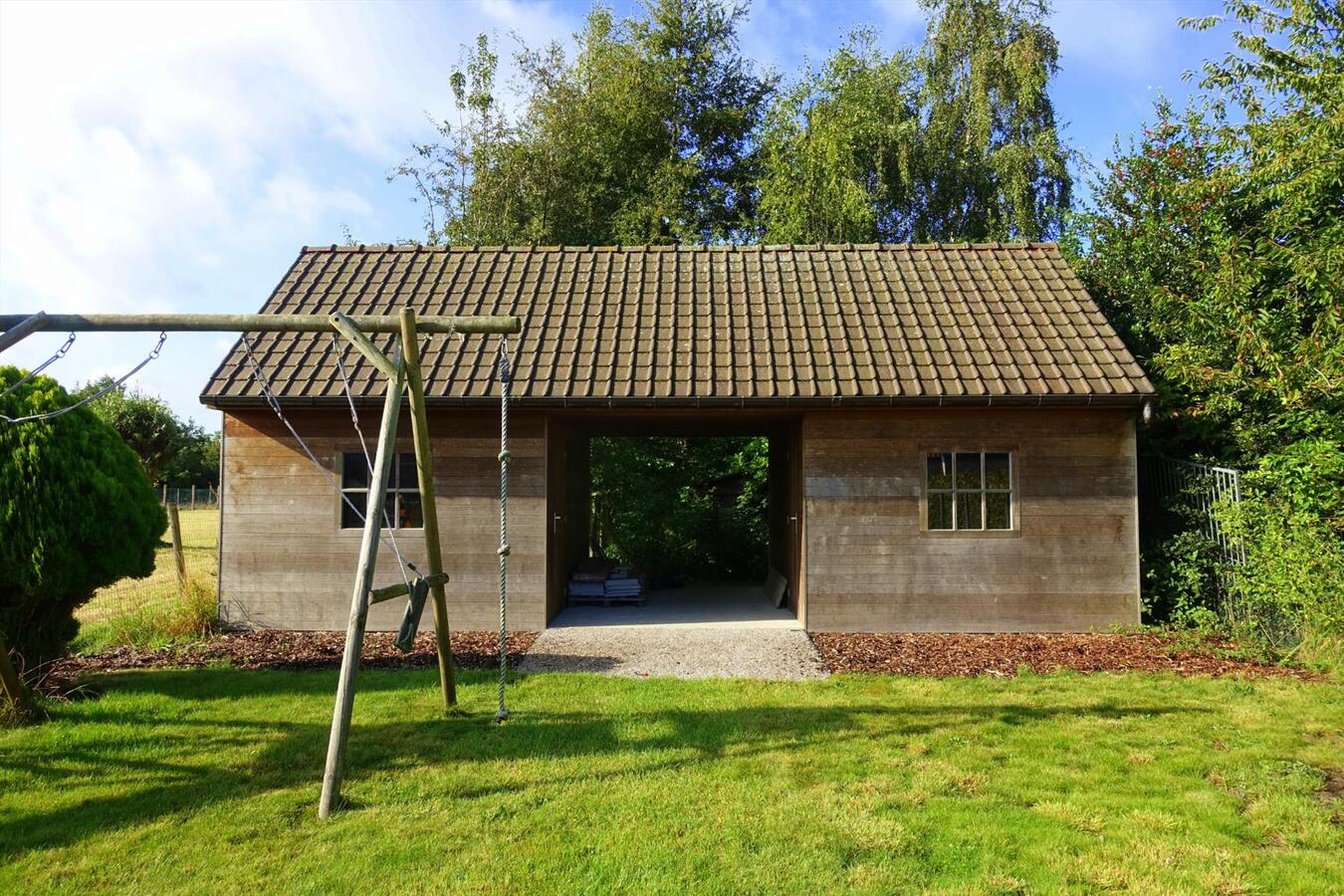 Gezellige half-open woning met zonnige tuin 