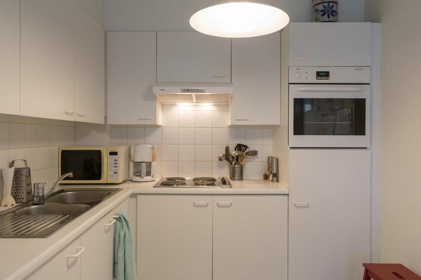 Gelijkvloers villa-appartement met zonnige tuin op toplocatie 