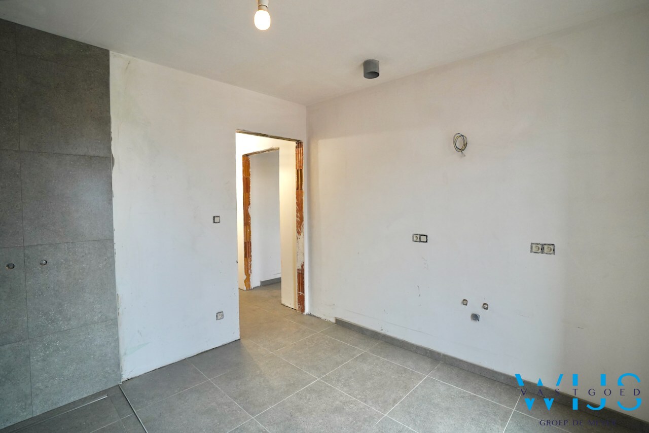 Drieslaapkamer appartement met garage in hartje Ertvelde ! 