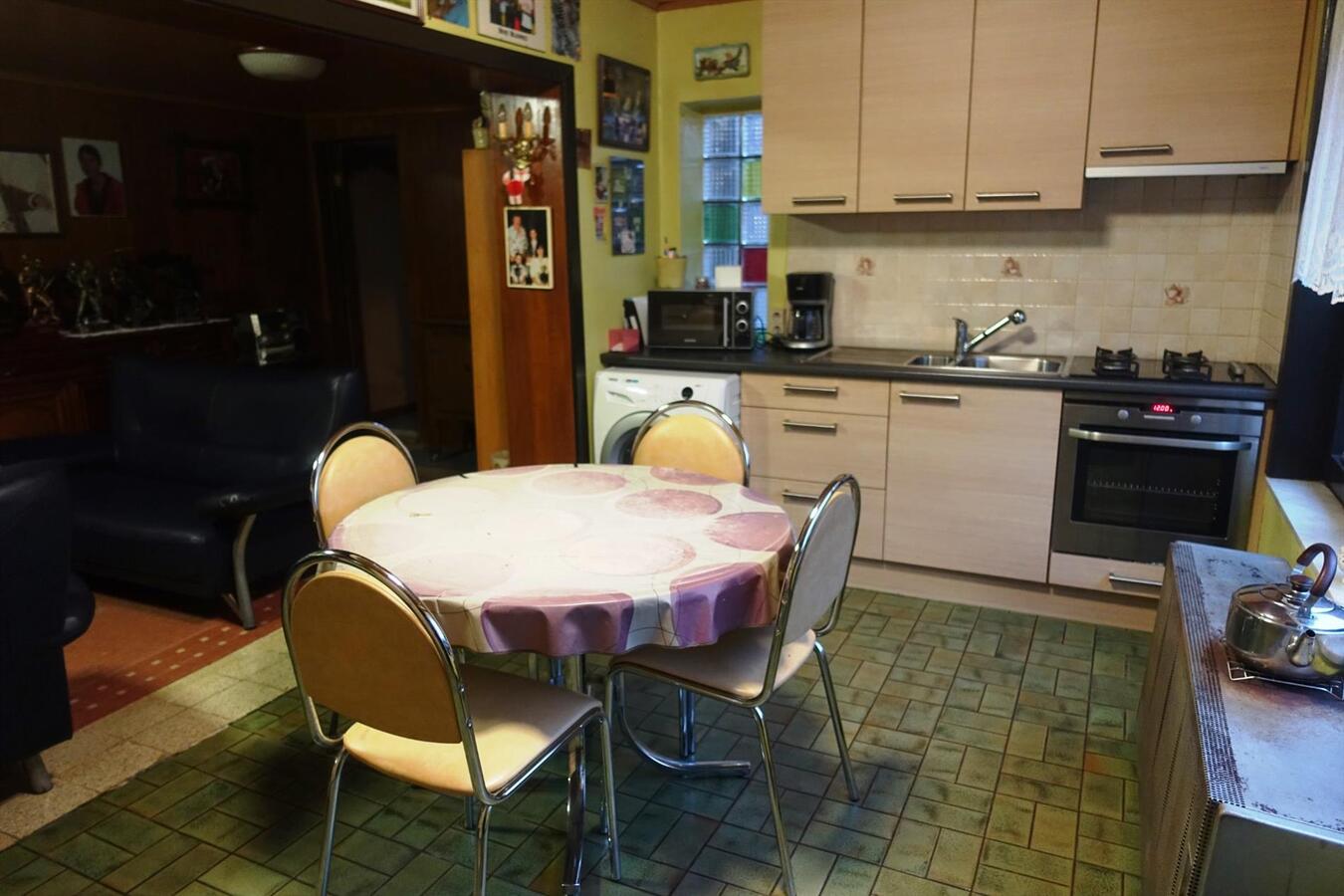 Degelijke woning met groot bijgebouw 