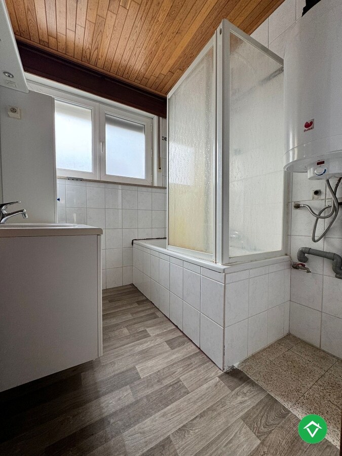 Te koop: Uniek gebouw met 2 appartementen, garage en ruime tuin – hartje Nieuwpoort-Stad 