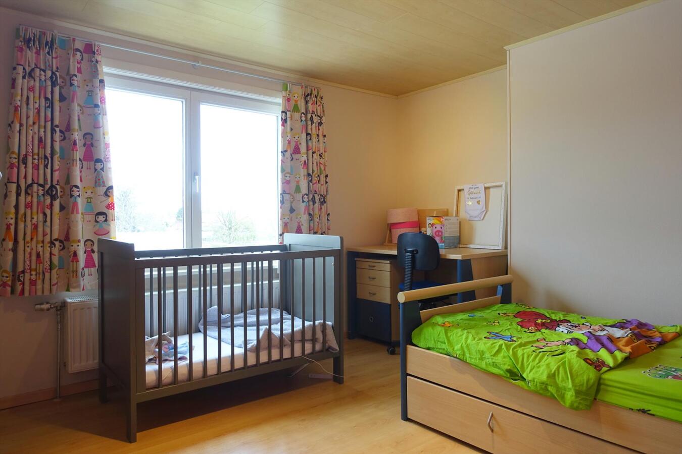 Centraal gelegen half-open woning 