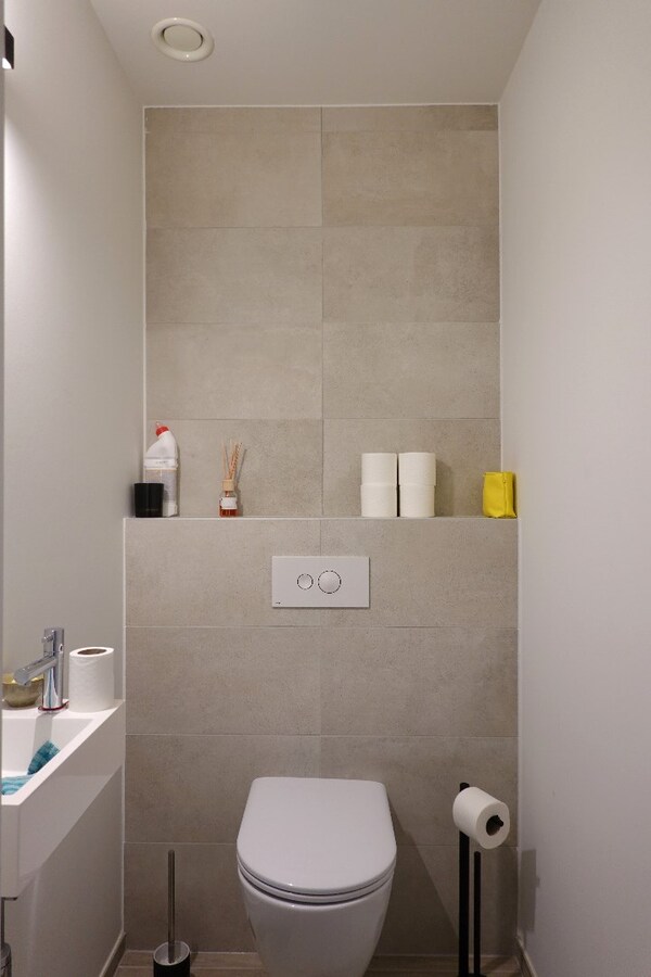 Kwalitatief nieuwbouwappartement met enorm terras en garagebox 