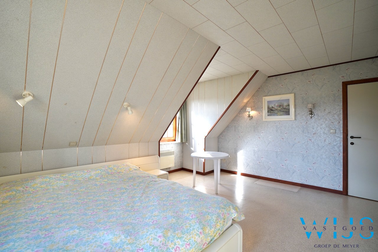 Fantastische open bebouwing met dubbele garage in gegeerde woonwijk te Evergem 