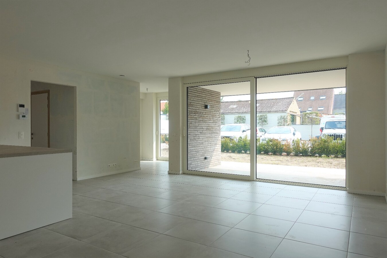 Nieuwbouwappartement met terras en tuin 