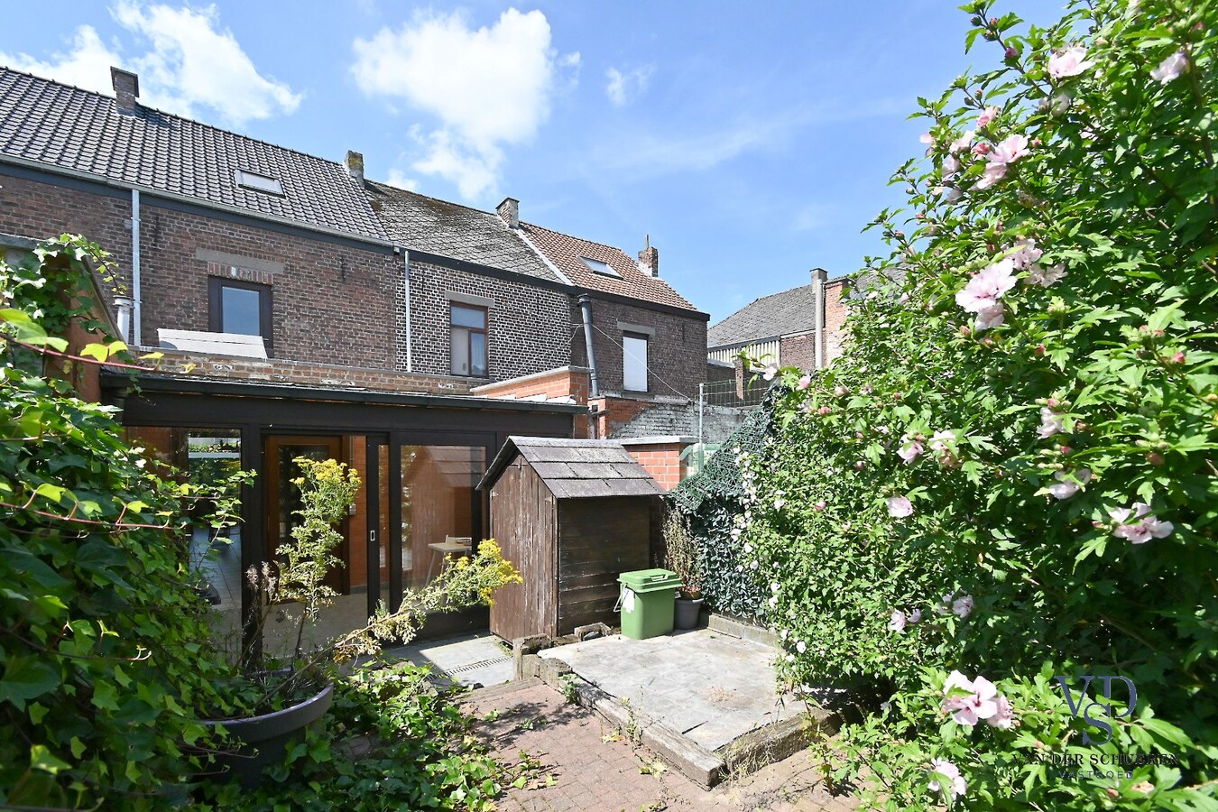 Knusse starterswoning met koertje 