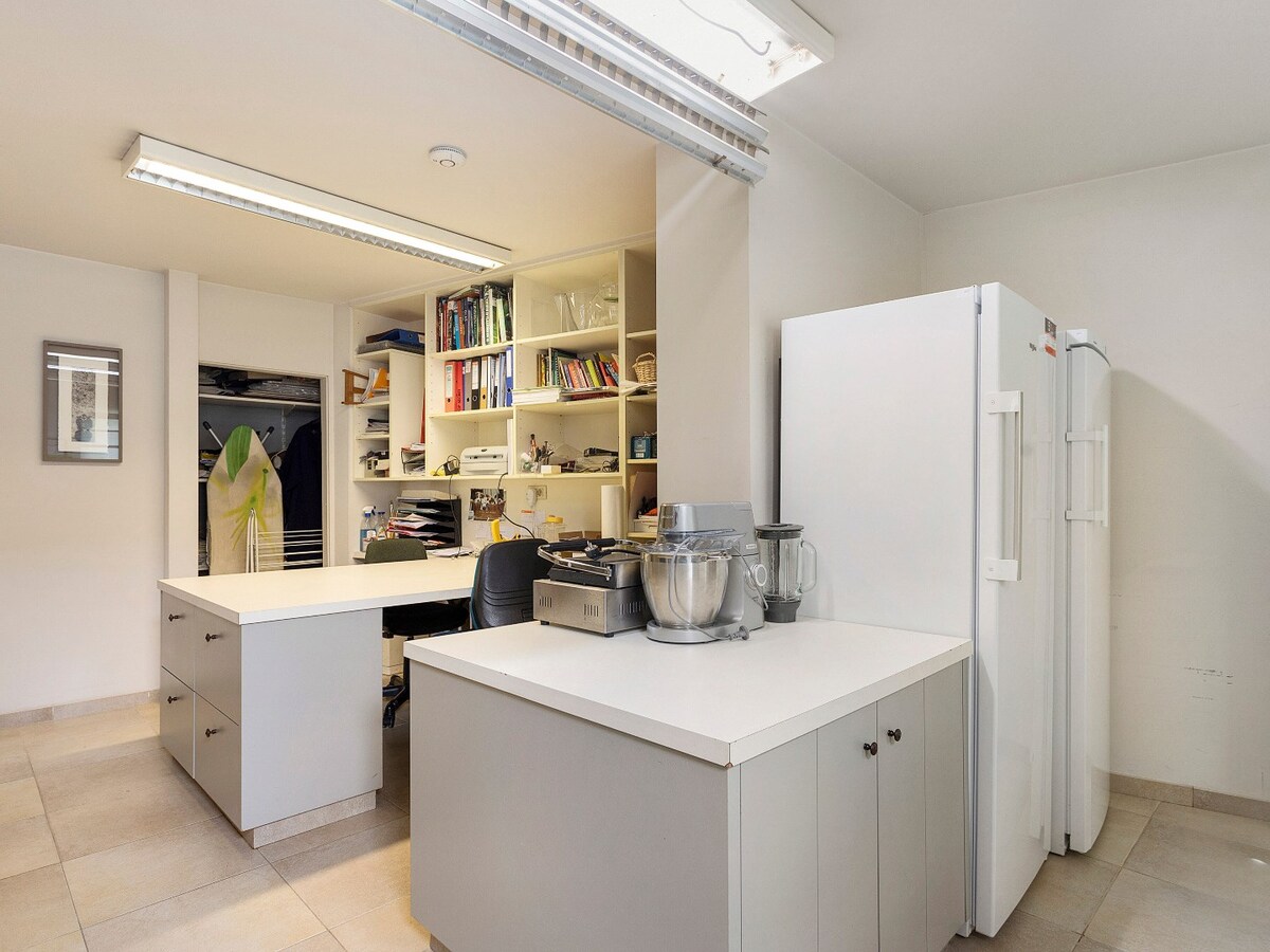 Charmant handelspand met woonst op de markt in Kruishoutem 