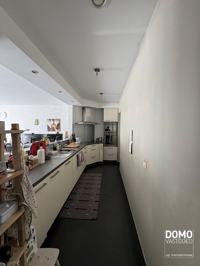 Gelijkvloers appartement met tuin en ondergrondse garage te Kermt - energielabel B -121m² bewoonbare oppervlakte 
