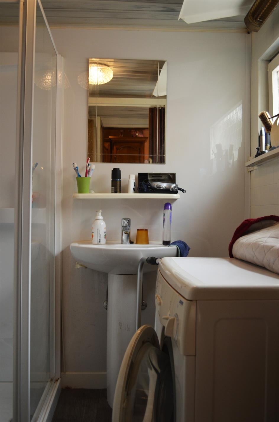 Te renoveren rijwoning met  garage en uitweg  nabij centrum Eeklo 