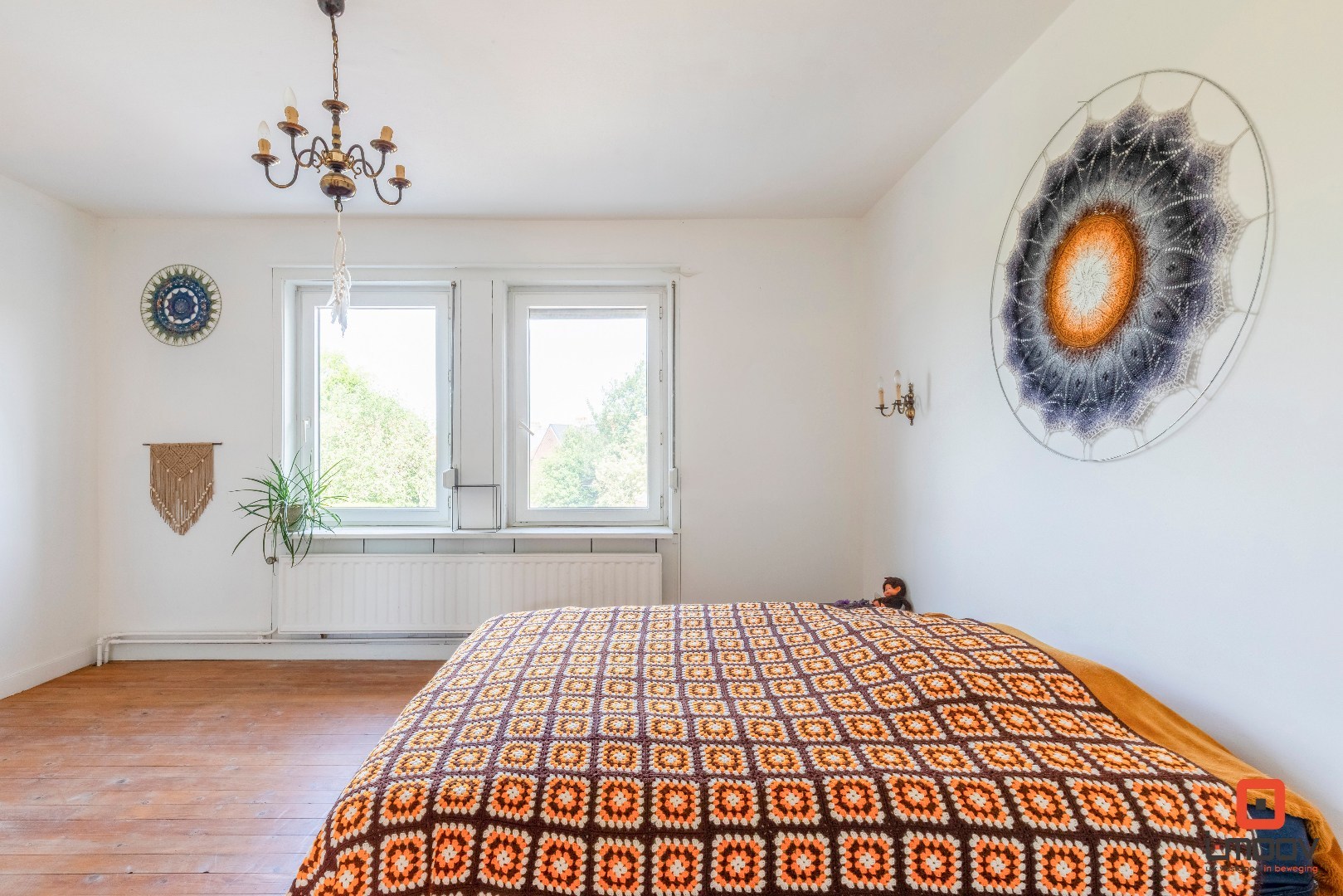 Karaktervolle tuinwijkwoning met unieke architectuur en garage te Gentbrugge 