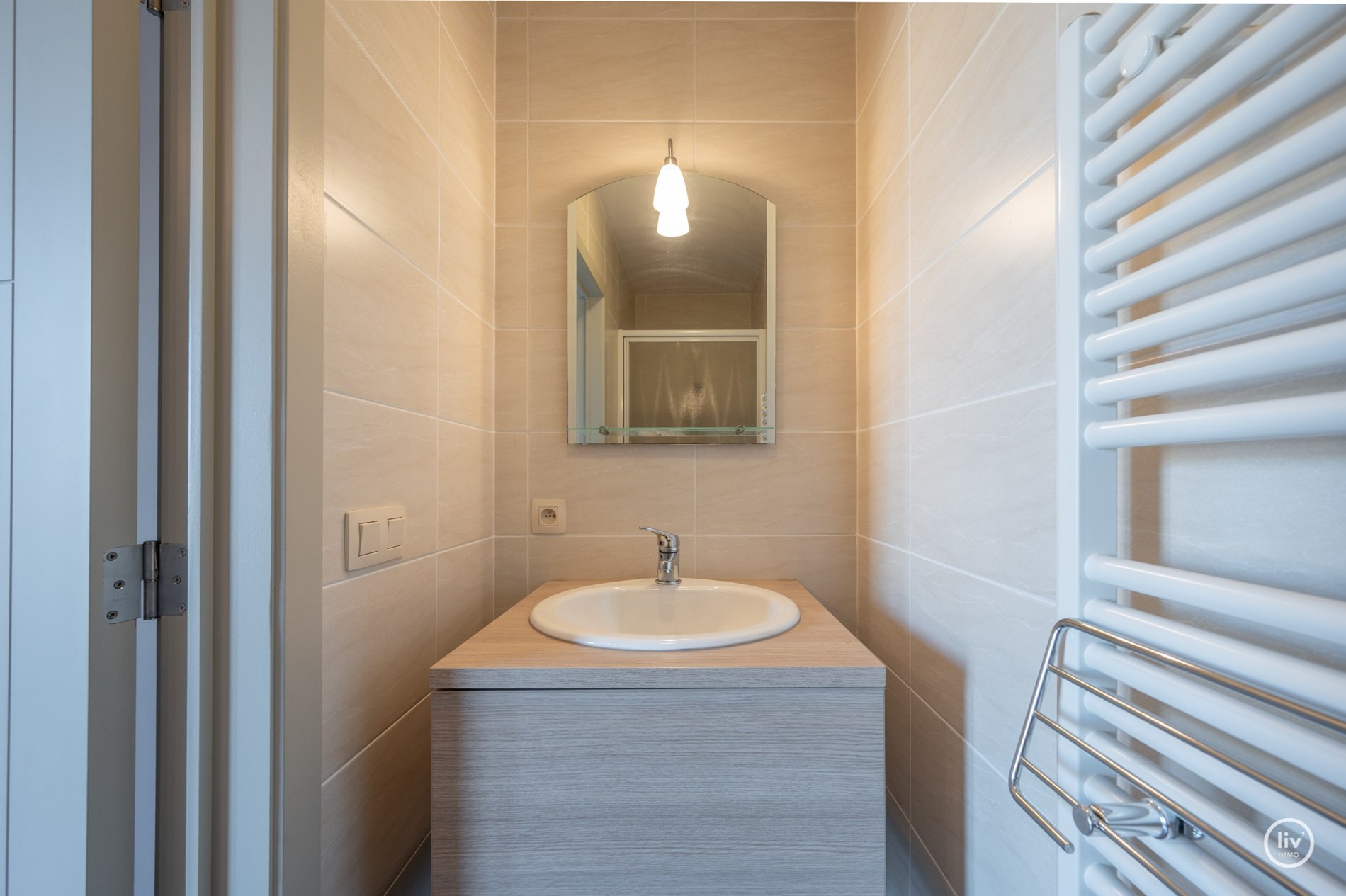 Centraal gelegen 2 slaapkamer appartement met ruime terrassen in een recent gebouwde residentie (met mog. tot aankoop van inpandige garage) 