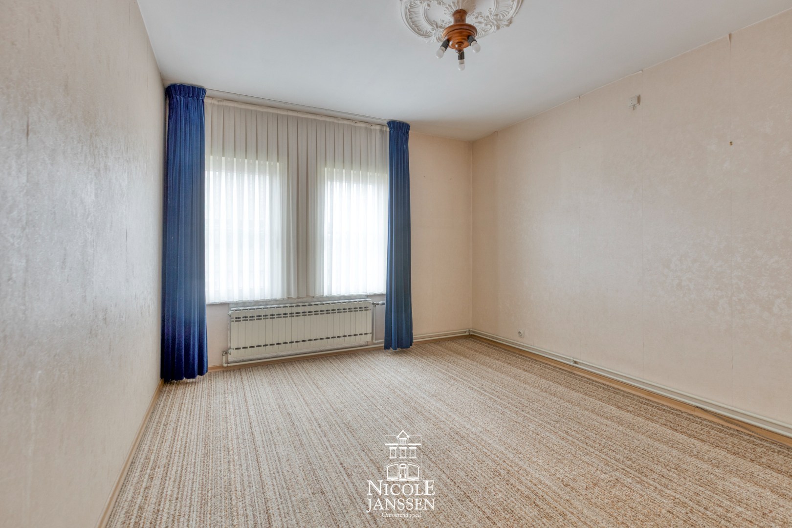 Derde slaapkamer met tapijt