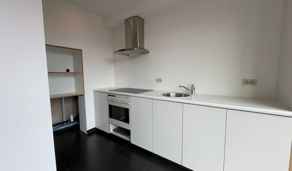 Handelspand met garage te koop in Merelbeke-Melle