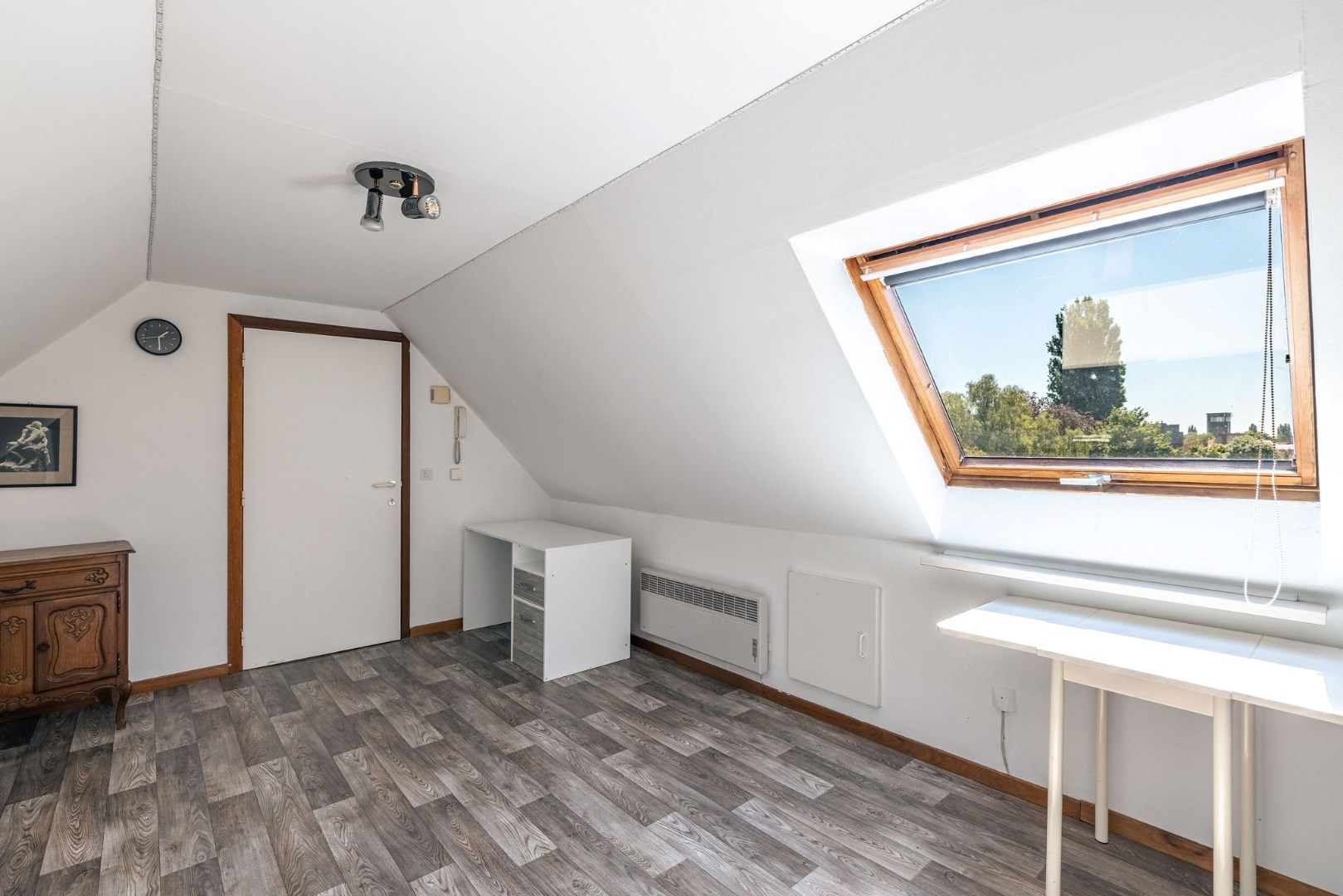 Lichtrijke studio met parkzicht te Sint-Amandsberg 