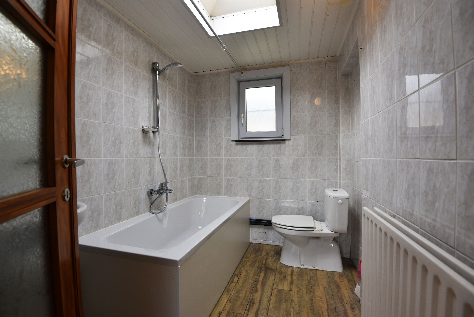 Woning met 1 slpk en dubbele garage te Adegem 