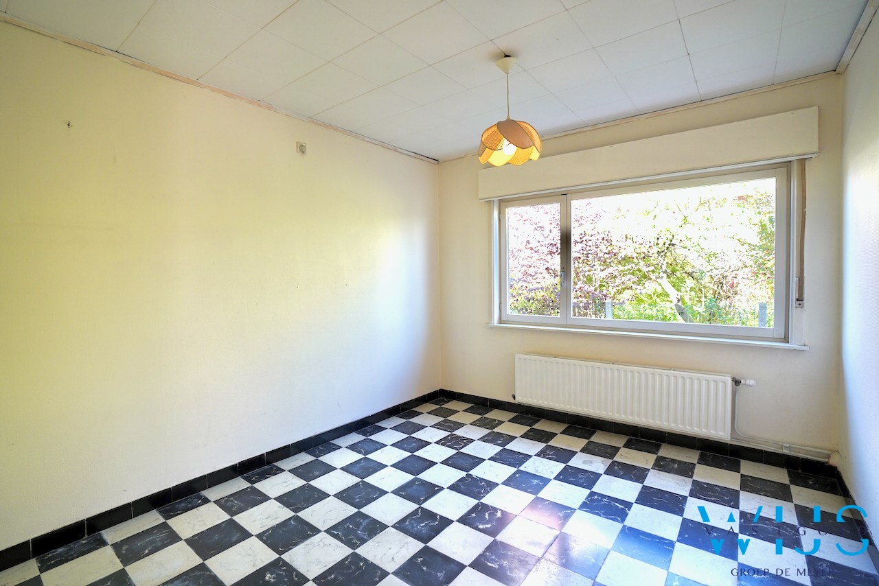Open bebouwing op ruim perceel van 892m² te Ertvelde ! 