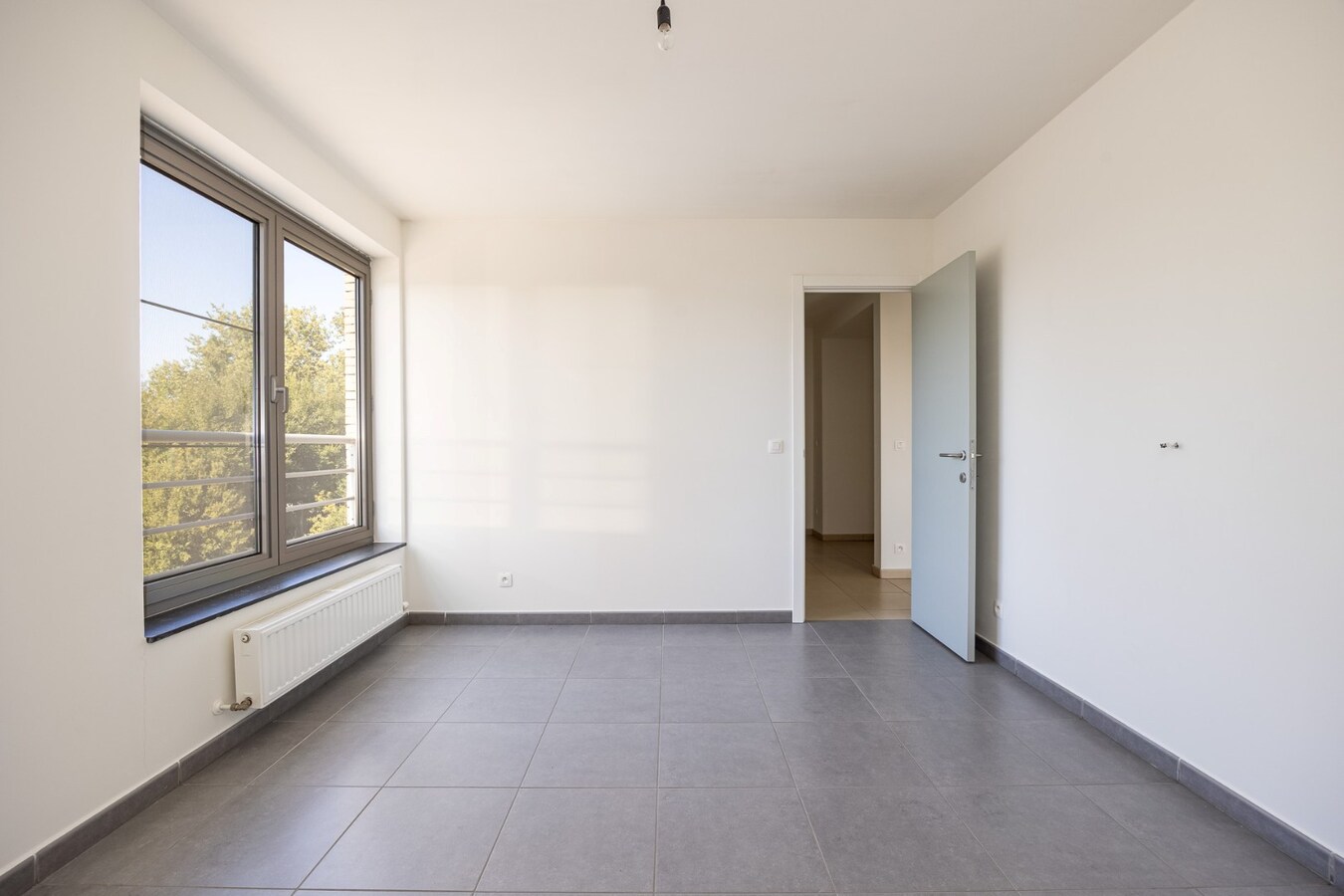 Recent energiezuinig appartement met 2 slpk. en zeer ruim terras te Niel! 