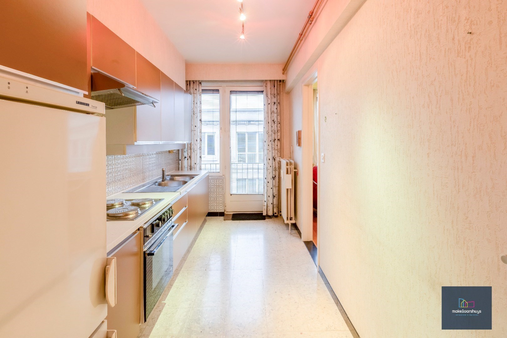 Nabij Gent Sint-Pieters ; Ruim appartement met 2 slp. fietsenberging en kelder 