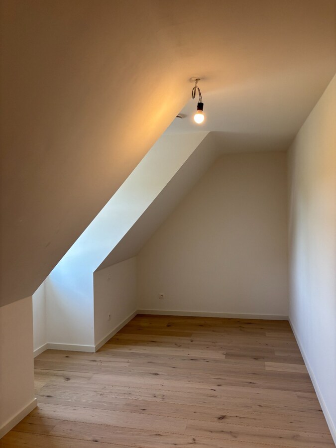 Nieuwbouwwoning met West-tuin in het centrum van Schilde 