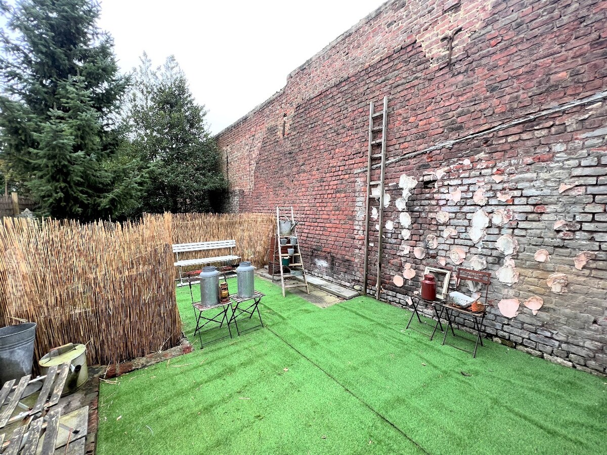 Handelspand met woonst en tuin op zeer commerciële ligging! 