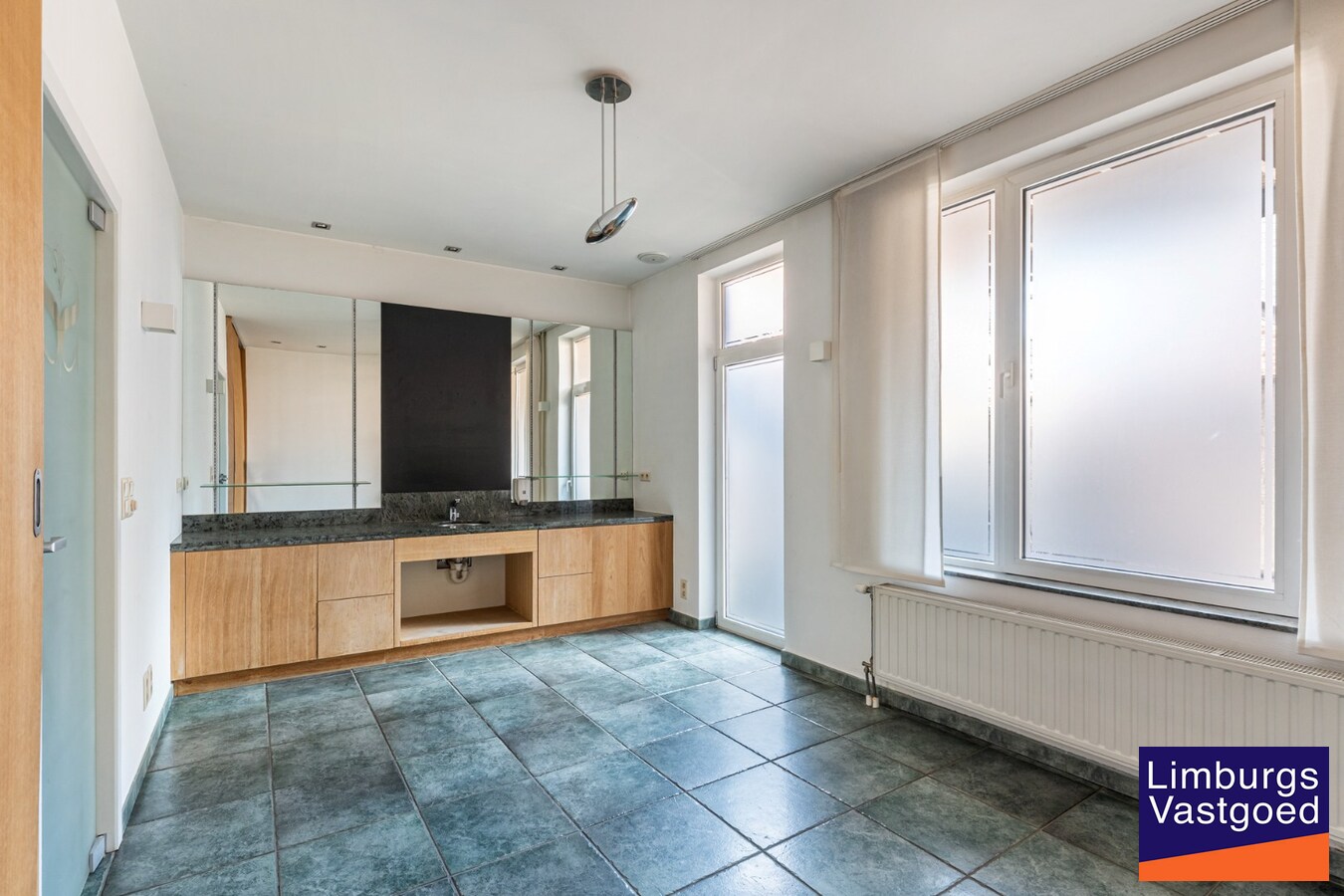 Handelshuis op commerciële topligging aan de Grote Markt 