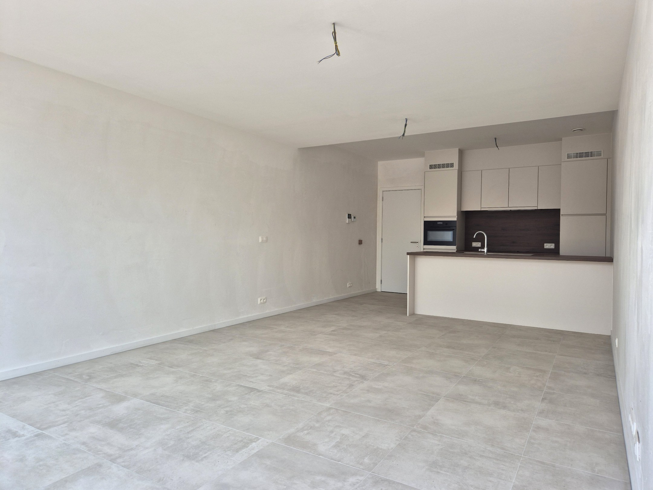 Gelijkvloers appartement met 2 slaapkamers, tuin en terras 